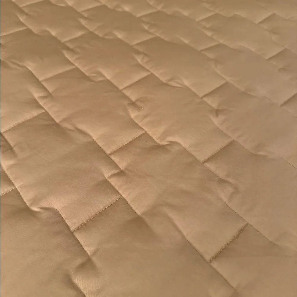 Brand new Crate & Barrel golden tan quilt with 2 standard sized shams